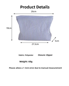 Detailed dimension guide of blue seersucker striped pouch showing size and polyester material