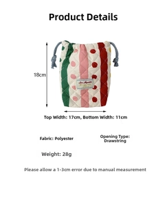 Quilted camera pouch detail showing retro stripe patterns and dimensions of 18cm by 17cm