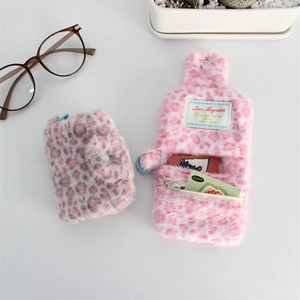 Detailed interior of plush pink leopard print wallet with card slots and zipper pocket