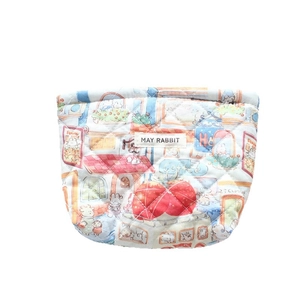 Quilted floral makeup bag with cute rabbit pattern and bow detail for travel