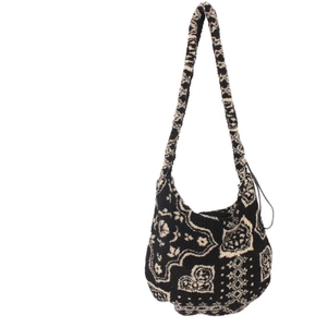 Winter plush tote bag with black and white geometric patterns and adjustable strap