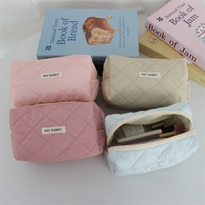 Quilted heart cosmetic bags set in pastel colors with spacious storage and top zipper