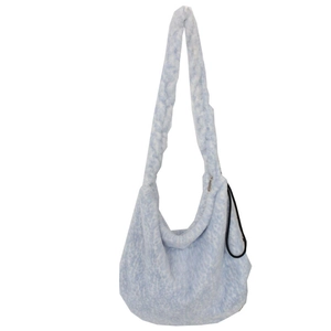 Spacious light blue faux fur shoulder bag with soft plush texture and wide strap