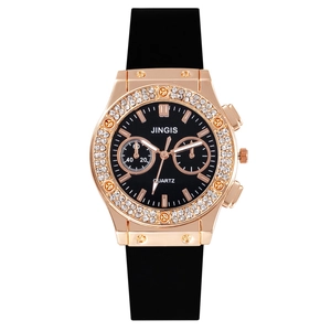 Fashionable rose gold quartz watch with rhinestone bezel and black silicone strap