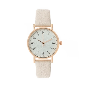 Minimalist women's watch with rose gold case and cream lychee pattern leather strap