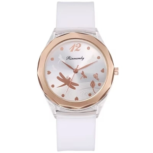 Minimalist white silicone quartz watch featuring rose gold dragonfly and floral dial patterns