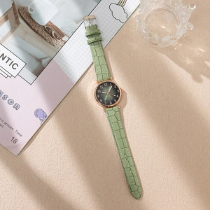 Women's quartz watch with green gradient dial and rose gold case on crocodile strap