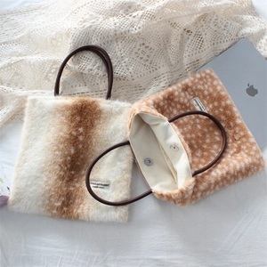 Winter plush tote bag with deer pattern, faux fur material and leather rope handles