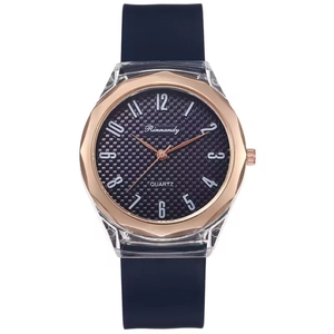 Detailed close-up of quartz watch with blue silicone strap and rose gold bezel