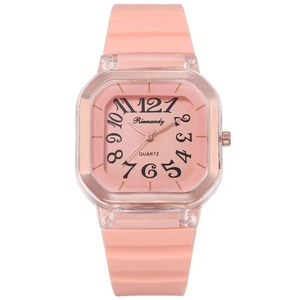 Pink minimalist square quartz watch with a silicone strap and artistic digital dial