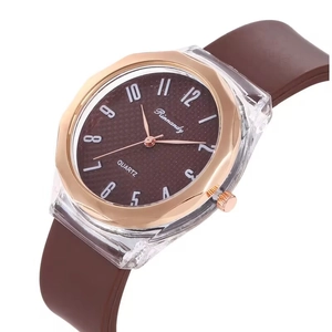 Close-up of a fashion quartz watch with transparent case and rose gold octagonal bezel