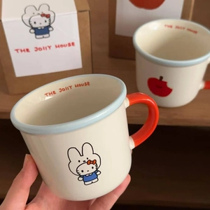 Cute ceramic Hello Kitty mug in white with red handle and bunny costume print
