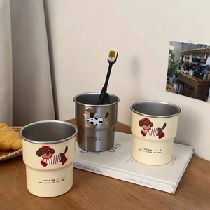 Cute dachshund stainless steel mouthwash cups set on a warm wooden aesthetic background