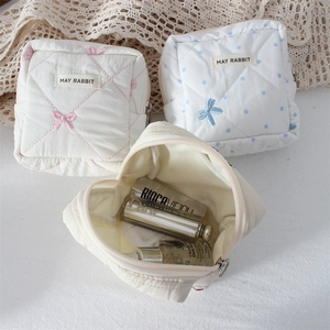 Quilted floral makeup pouch for organizing cosmetics and small personal essentials