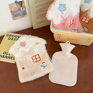 Detail showing plush faux fur cover with house embroidery and anti-slip water bottle