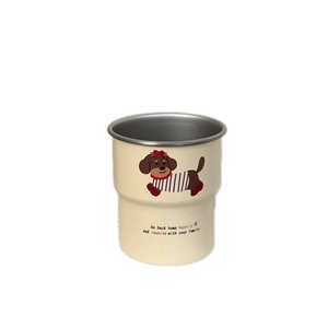 Creamy yellow stainless steel dog pattern mug with inspirational quotes on white background