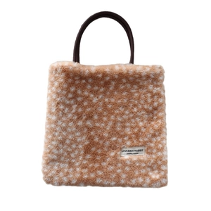 Winter plush deer print tote bag with soft faux fur texture and brown handles