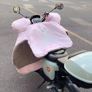 Detail of pink cartoon scooter windbreak cover with thick fleece lining for winter warmth