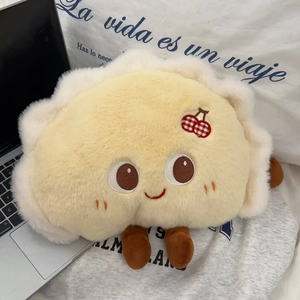Close-up of cute cartoon dumpling plush cover with soft embroidery and cherry detail