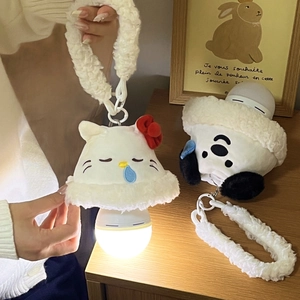 Close-up of cute cartoon plush night light with soft LED glow and convenient hanging strap