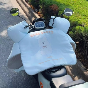 Detail of light blue windproof scooter cover with plush lining and cute puppy print