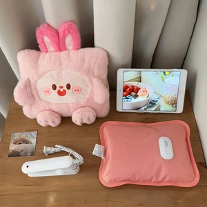 Pink plush rabbit hot water bottle set including electric liner and charging cable