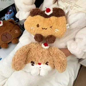 Detail of plush cartoon hand warmers featuring cute brown bear and rabbit designs