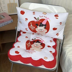 Close-up of cute cartoon cat and bear illustration on thick red and white chair cushion