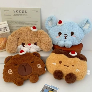 Detail of four cute plush cartoon animal covers for electric hot water bottles