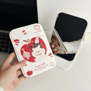 Close-up of cute bear and apple pattern on cream leather portable folding mirror