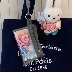 Grey transparent PVC card holder bag with plush pendant and decorative accessories