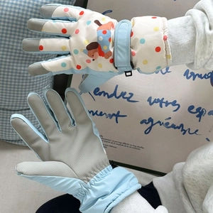 Waterproof light blue ski gloves for women featuring cute cartoon puppy and polka dot pattern