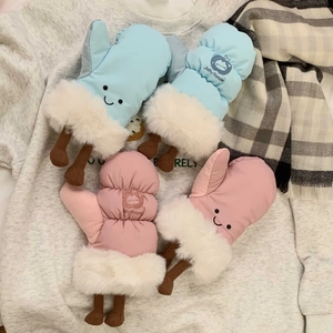 Detail of pink and blue cartoon ski mittens with plush trim and cute leg design