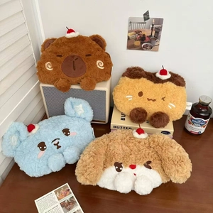 Detail of cute plush cartoon animal hand warmers in soft brown, blue, and cream colors