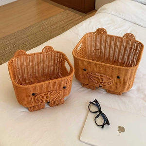 Set of two bear-shaped faux rattan storage baskets with handles for home organization