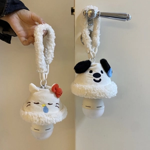 Detail of plush cartoon night lights featuring kitten and puppy shapes with fleece lanyards