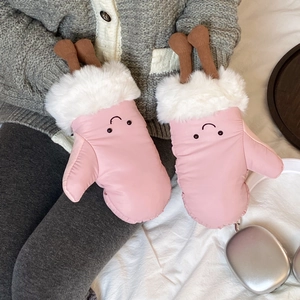 Detail of pink waterproof ski gloves with faux fur trim, antlers, and smile embroidery
