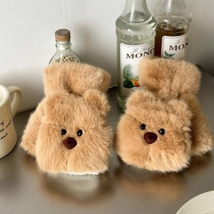 Detail of plush brown bear convertible gloves showing soft faux fur and cute facial features