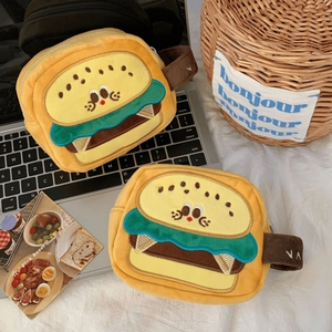 Detail of cute plush hamburger camera storage bags showing the soft fuzzy fabric and embroidery