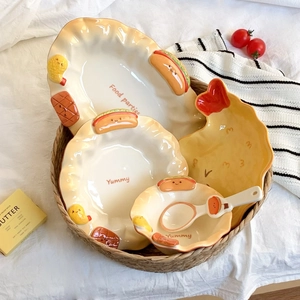 Detailed relief food patterns on wavy edge ceramic plates and bowls for home dining