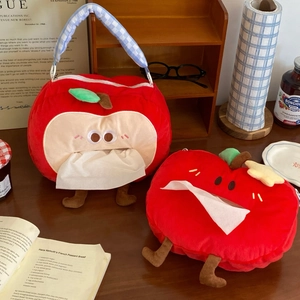 Detail of red plush apple tissue holders with cute 3D legs and green leaf decor