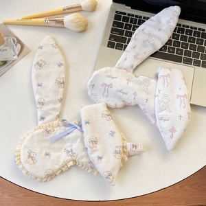 Cute bunny ear sleep mask with floral lace trim and elastic strap for travel and home