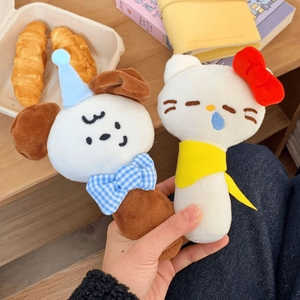 Detailed close-up of cute plush handheld mirrors featuring cartoon dog and cat characters