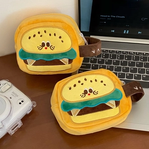 Detailed plush burger camera case featuring soft embroidery and a brown carrying handle