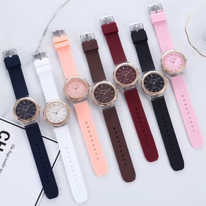 Collection of quartz watches with colorful silicone straps and rose gold bezels