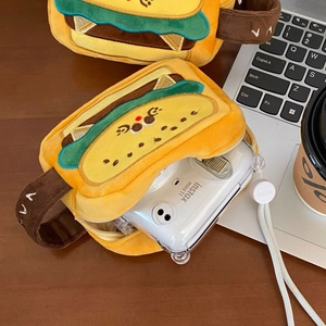 Plush hamburger shaped camera case showing soft texture and spacious interior for instax mini