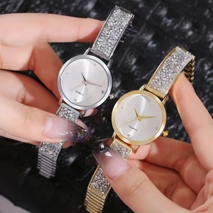 Eleganti orologi al quarzo da donna in oro e argento con cinturini in pavé di cristalli