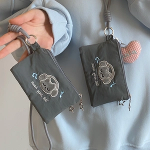 Gray nylon neck pouch featuring a cat embroidery and a star-shaped zipper detail