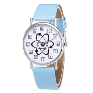 Macro detail of quartz watch dial with chemical element symbols and light blue strap
