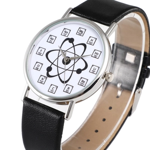 Detailed view of quartz watch dial with creative chemical element periodic table design